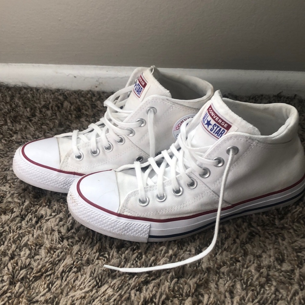 Gently used mid top white converse